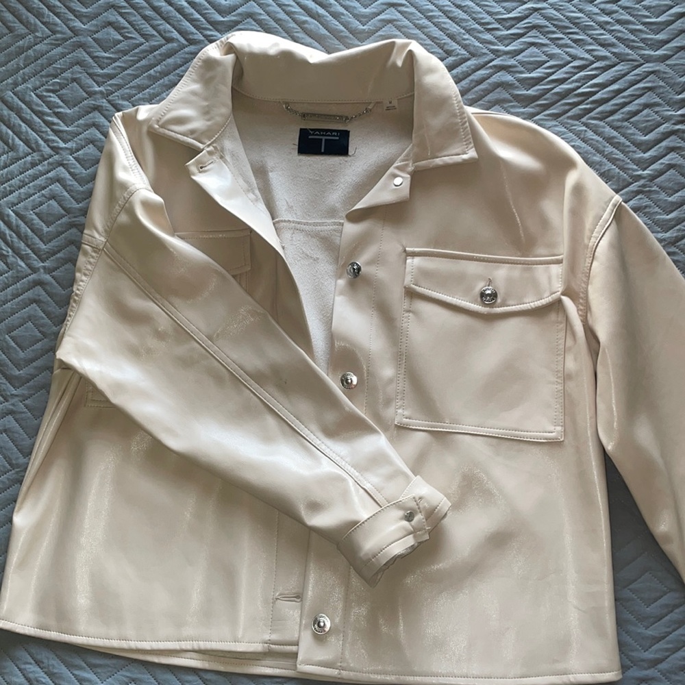 medium T Tahari leather jacket. color- beige. worn once